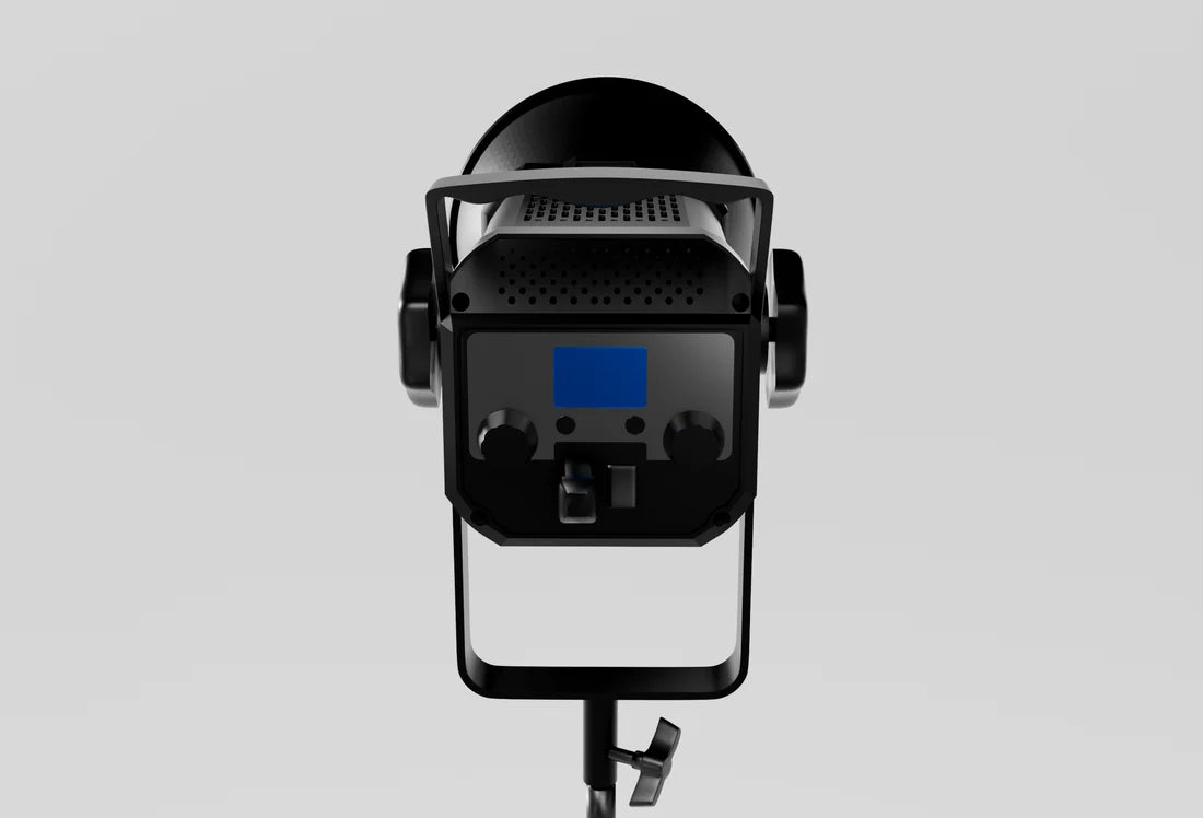 Black studio light with blue screen on a gray background